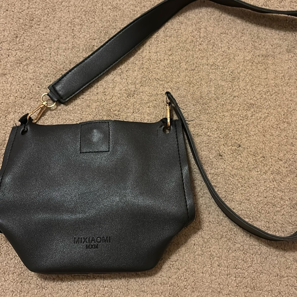 black cross strap bag
